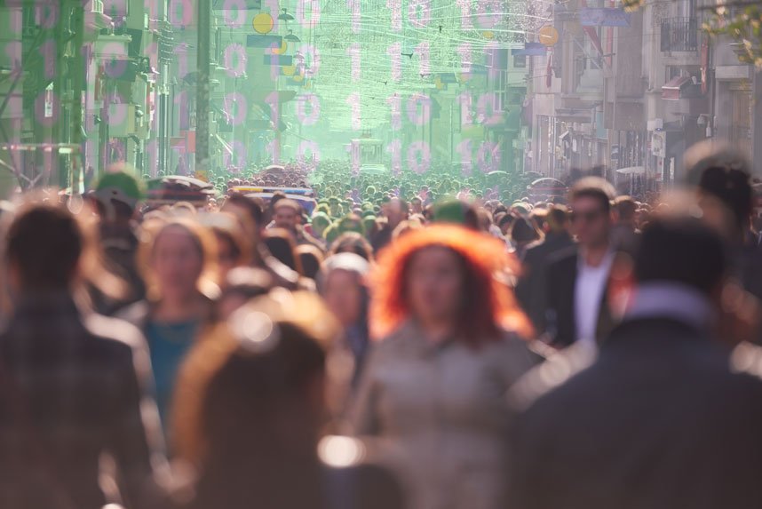 crowd walking on a busy city street - world building in screenwriting - gomakemovie