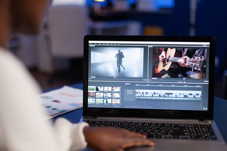 video editor at work - choosing video editing software - go make movie